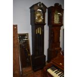 An early to late 20th Century reproduction oak long case clock having moon dial, triple weight
