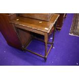 An early to mid 20th Century oak twist leg side table, width approx. 55cm