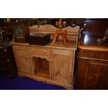 A natural pine ledgeback sideboard, width approx. 132cm