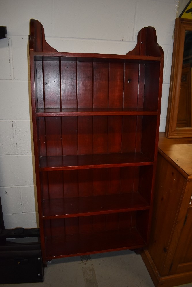 A stained pine wall shelf, approx. 150 x 65cm