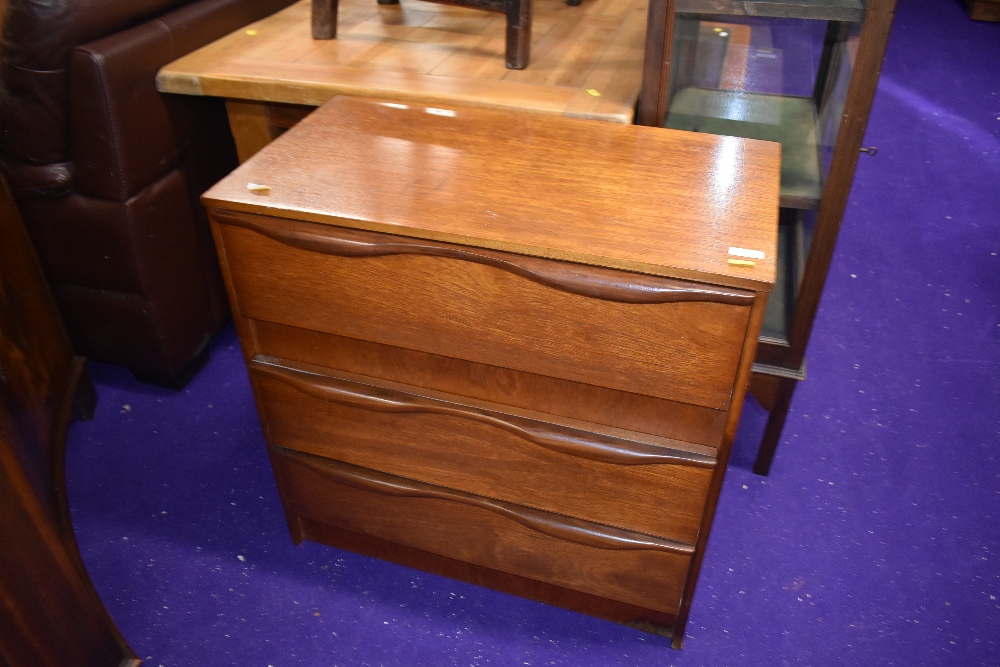 A vintage teak three drawer chest, width approx. 70cm