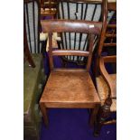 A 19th Century sold seat rail back dining chair