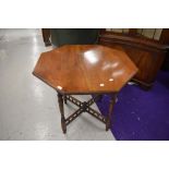 A late Victorian mahogany octagonal table having turned and bobbin frame, approx. diameter 83cm