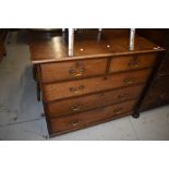 A 19th Century oak chest of two over three drawers, having later, but still period brass drop
