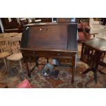 A composite desk on stand, top converted corner cupboard on Jacobean style base with twist legs