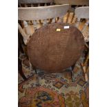 An early 20th Century oak firescreen/folding table