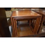 A vintage teak G plan nest of three tables