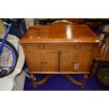 A vintage HMV gramophone in double cabinet, labelled model number 261, width 78rpm records and