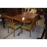 A nice quality reproduction extending dining table and set of six (four +two regency dining