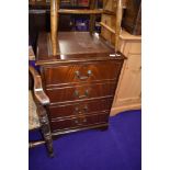 A reproduction Regency two drawer filing cabinet