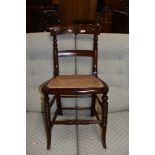 A Victorian stained frame cane seated bedroom chair