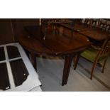 A georgian mahogany D end dining table having single centreleaf, on tapered legs, diameter 123cm,