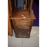 A reproduction oak pot cupboard, height approx. 70cm