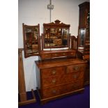 A Victorian pitch pine dressing table having triple mirror back