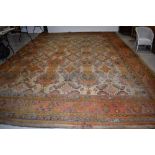 A large antique carpet square, labelled for Gillows, Lancaster, approx. 400 x 580cm