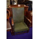 A 1930's stained frame recliner armchair