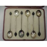 A cased set of silver coffee spoons having coffee bean knops, Sheffield 1914, Mappin & Webb Ltd,
