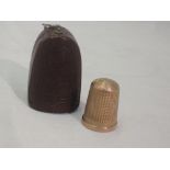 A 9ct rose gold thimble of traditional form with travel case, Birmingham, possibly 1918, James
