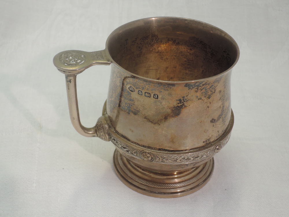 A silver christening mug bearing monogram to front and date to base with Celtic style handle and - Image 2 of 2