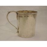 A silver christening mug having bright cut decoration and inscribed Bernard 1922, Sheffield 1919,