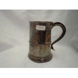 A Sheffield plate tankard with wooden base, thread detail to body and heart terminal to handle,