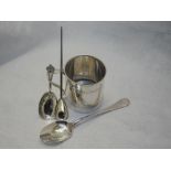 A small silver christening mug of plain form having striped decoration and monogram to front,