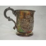 A Georgian silver Christening tankard bearing inscription dated 1891 and Repousse nursery scene with