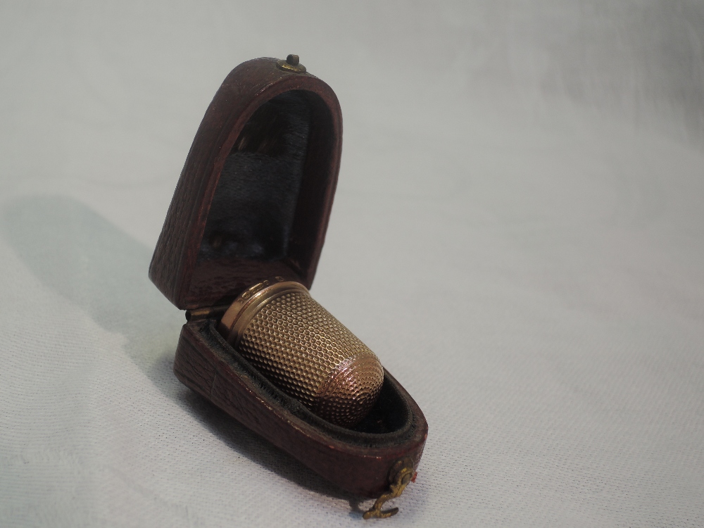 A 9ct rose gold thimble of traditional form with travel case, Birmingham, possibly 1918, James - Image 2 of 3