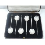 A cased set of six silver coffee spoons having coffee bean knops, Sheffield 1930, Cooper
