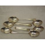 Six Edwardian silver dessert spoons of plain form bearing monogram G to terminals, Chester 1906,