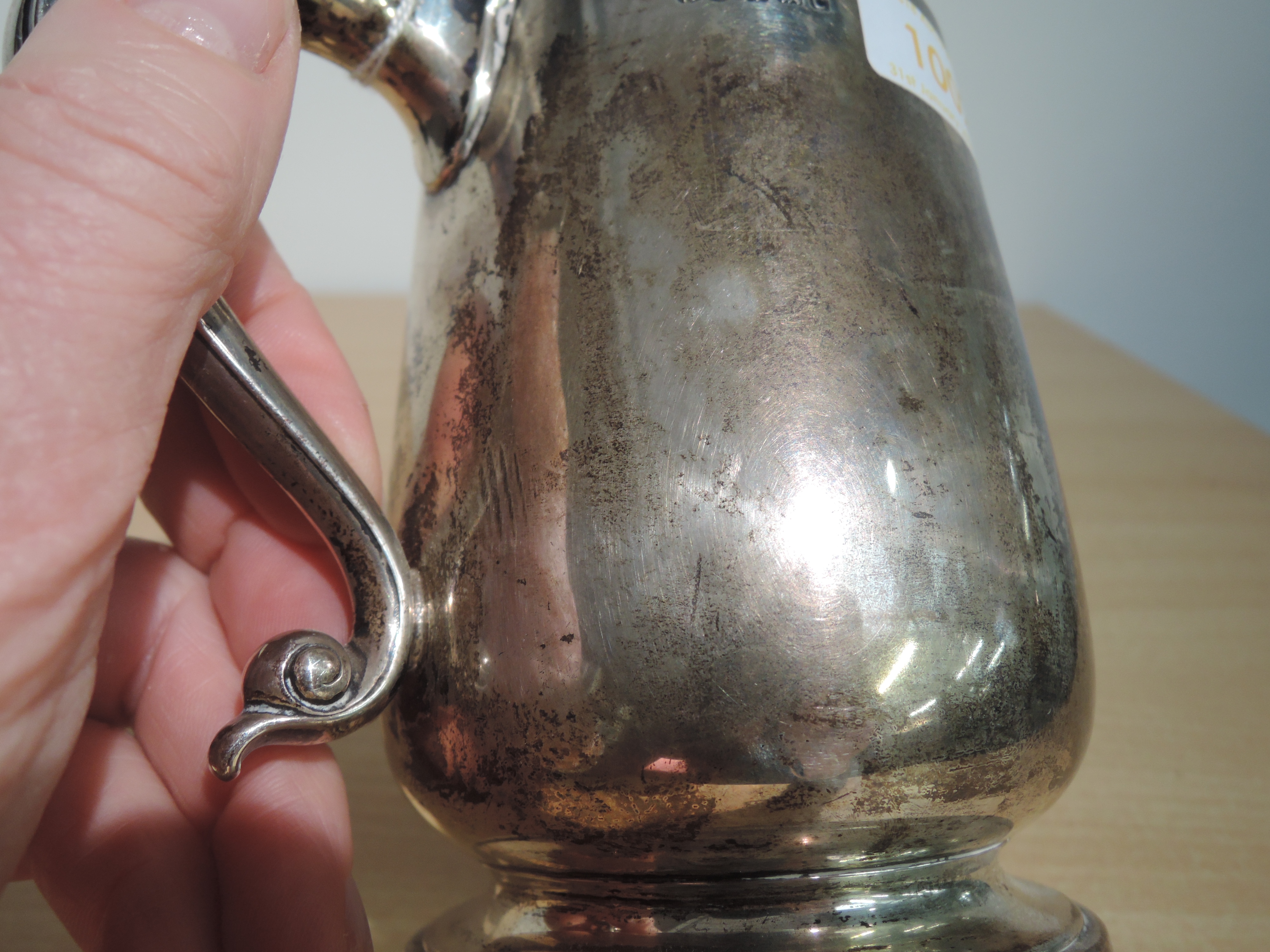 An Edwardian silver tankard of plain baluster form on circular pedestal foot with thumb rest loop - Image 3 of 3