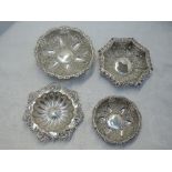 Four HM silver trinket dishes having moulded and pierced decoration, approx 151g