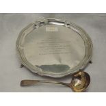 A silver card tray of traditional form bearing pie crust rim, trefoil paw feet and inscription to