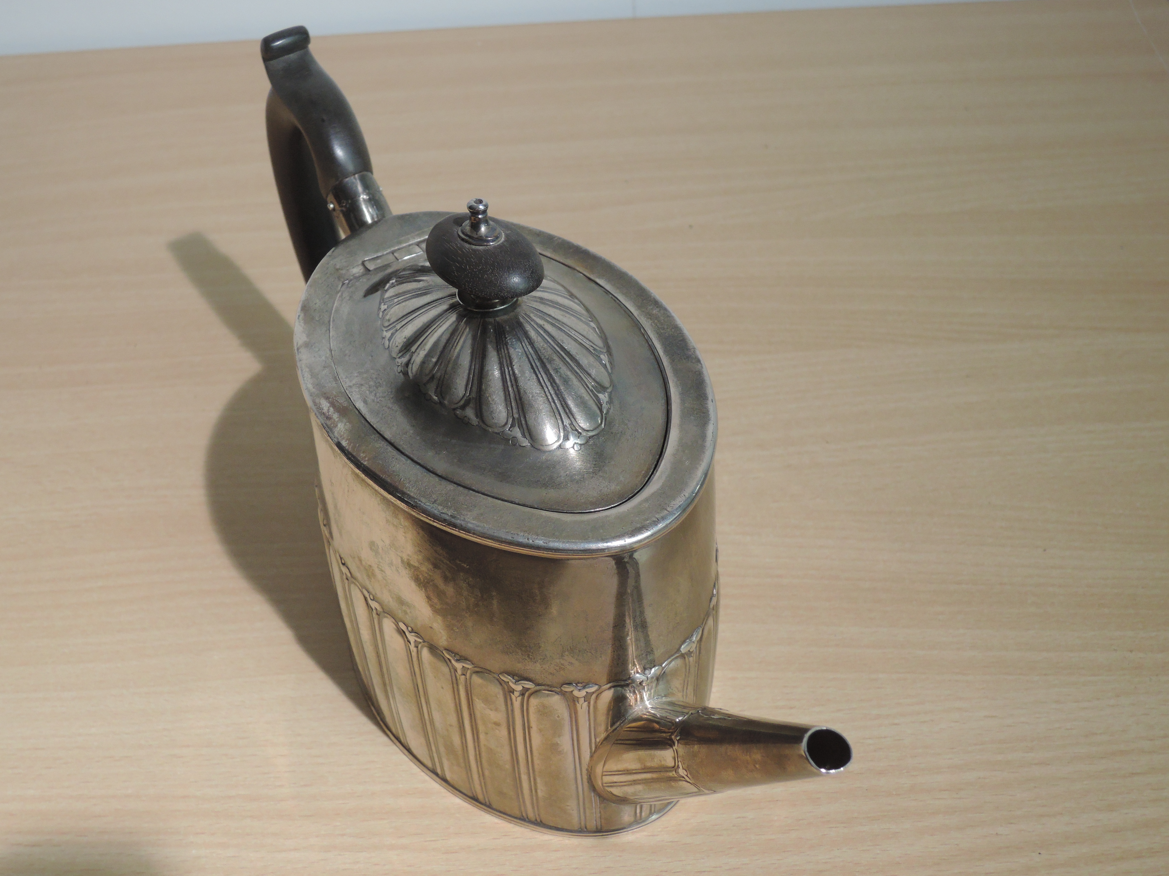 A Georgian silver teapot of drum form having gadrooned decoration and fruitwood handle, bearing - Image 4 of 7