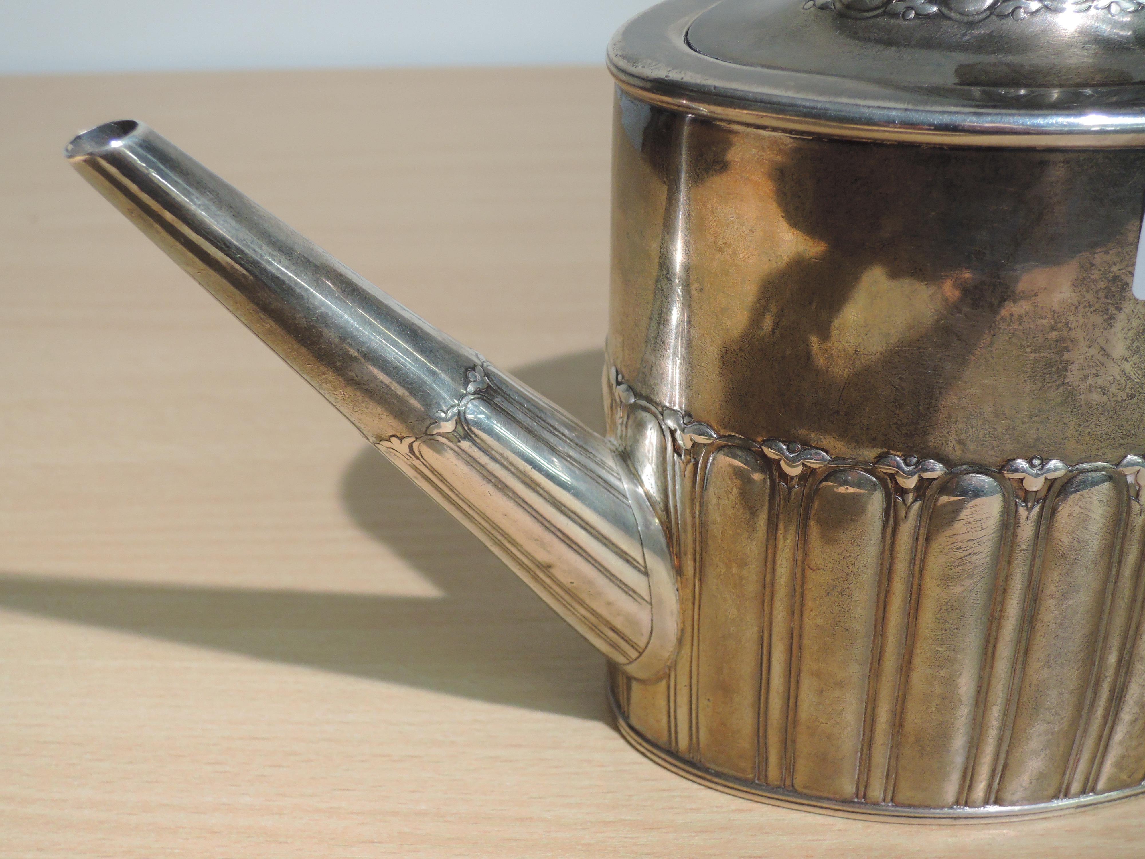 A Georgian silver teapot of drum form having gadrooned decoration and fruitwood handle, bearing - Image 3 of 7