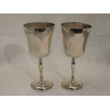 A pair of silver wine goblets having engraved grape vine decoration, Birmingham 1990, Charles S