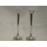 A pair of silver stem vases of classic trumpet form, with weighted bases and bearing oversized