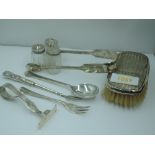 A small selection of HM silver and white metal including clothes brush, glass pepperettes and