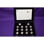A Royal Mint GB 2008 set of 14 different Silver £1 Coins with gold plating to reverse of design,
