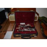 A Buffet Crampon clarinet in fitted case , model E13 (B), serial number K139960 with additional