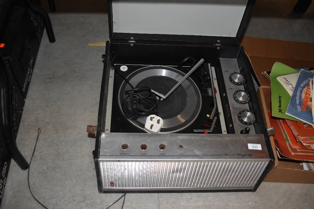 A vintage Bush transistorise gramophone, having 4 speed Garrard deck