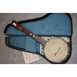 An early 20th Century ukulele banjo , in semi hard case, no makers mark, retail stamp to back of