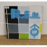A vinyl copy of REM's ' Up ' long player - like the other REM albums listed these sold more on CD at