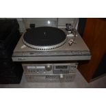 A JVC quartzlock record player with stackable JVC - KD-A33 A-X2 T-X1L