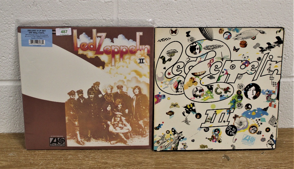 A lot of two Led Zeppelin albums - a double repress with extras and a later issue on orange, green