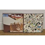 A lot of two Led Zeppelin albums - a double repress with extras and a later issue on orange, green