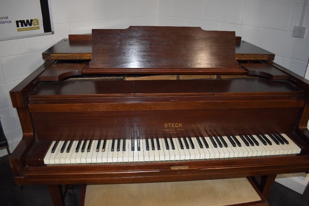 A vintage Steck Grand Piano (converted from pianola , the workings having been removed) in
