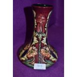 A Moorcroft vase, masquerade designed by Rachel Bishop, having rose and cornflower design to