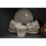 A part tea service by Queen Anne Ridgway having white and gold retro design
