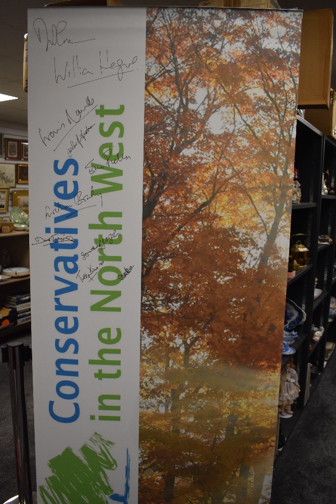 An advertising banner for the conservative party signed by various members including Eric Pickles